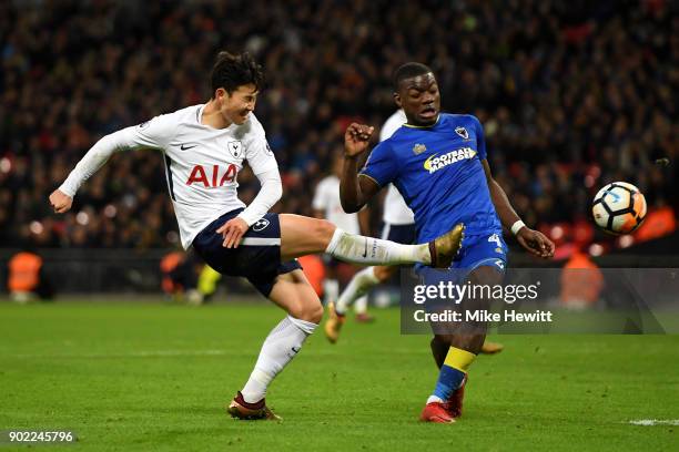 Heung-Min Son of Tottenham Hotspur shoots and misses during The Emirates FA Cup Third Round match between Tottenham Hotspur and AFC Wimbledon at...