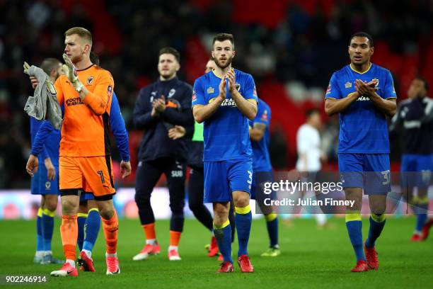 Wimbledon team shows appreciation to the fans following The Emirates FA Cup Third Round match between Tottenham Hotspur and AFC Wimbledon at Wembley...