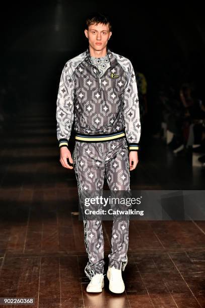 Model walks the runway at the Ben Sherman Autumn Winter 2018 fashion show during London Menswear Fashion Week on January 6, 2018 in London, United...