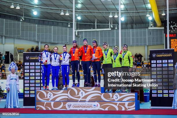 Team Russia, team Netherlands and Team Germany pose in the Ladies Team Pursuit medal ceremony during day three of the European Speed Skating...