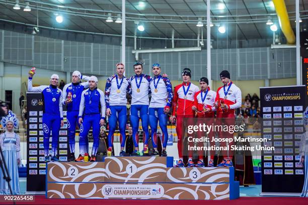 Team Finland, Team Russia and team Poland pose in the Men's Team Sprint medal ceremony during day three of the European Speed Skating Championships...