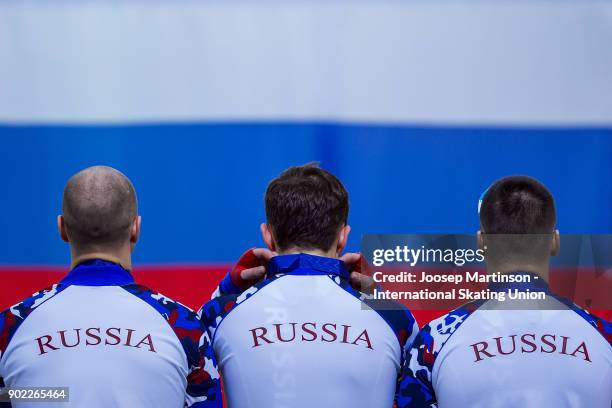 Team Russia react in the Men's Team Sprint medal ceremony during day three of the European Speed Skating Championships at the Moscow Region Speed...