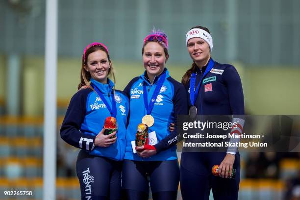 Francesca Bettrone and Francesca Lollobrigida of Italy and Vanessa Herzog of Austria pose in the Ladies Mass Start medal ceremony during day three of...