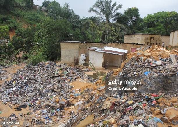 Massive garbage dump, swept by floodwater, is seen at the area after landslide that triggered by a flood following heavy rains at Ngaliema district...