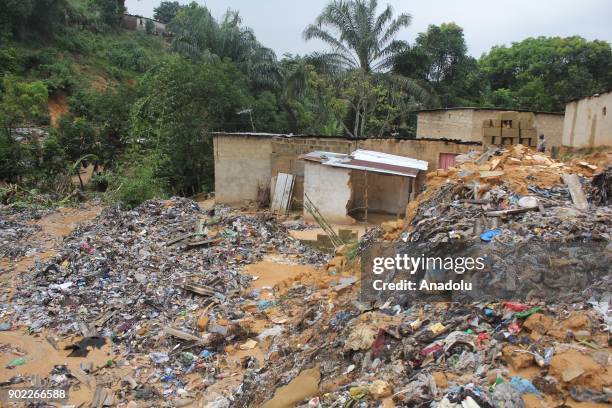 Massive garbage dump, swept by floodwater, is seen at the area after landslide that triggered by a flood following heavy rains at Ngaliema district...