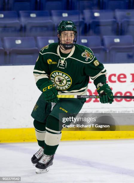 Vlad Dzhioshvili of the Vermont Catamounts warms up before a game against the Massachusetts Lowell River Hawks during NCAA men's hockey at the...