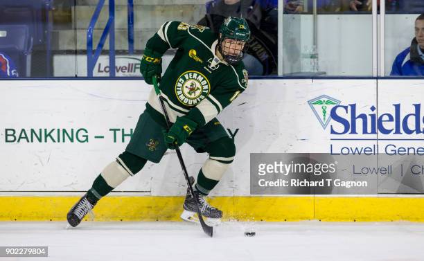 Bryce Misley of the Vermont Catamounts skates against the Massachusetts Lowell River Hawks during NCAA men's hockey at the Tsongas Center on January...