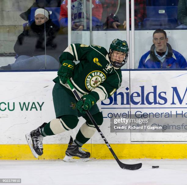 Bryce Misley of the Vermont Catamounts skates against the Massachusetts Lowell River Hawks during NCAA men's hockey at the Tsongas Center on January...