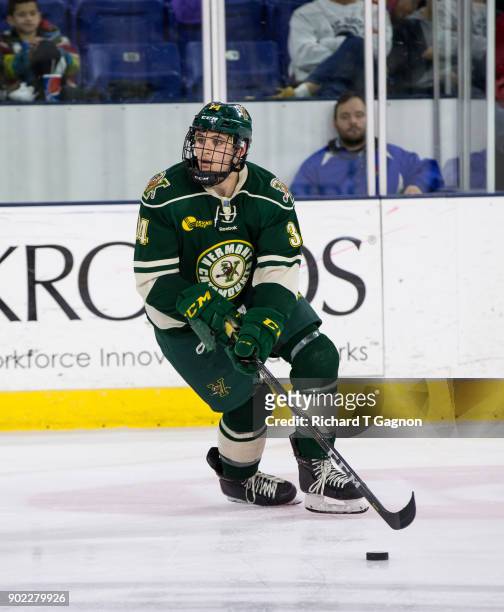 Jake Massie of the Vermont Catamounts skates against the Massachusetts Lowell River Hawks during NCAA men's hockey at the Tsongas Center on January...