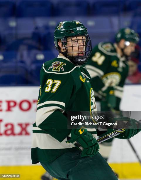 Corey Thomas of the Vermont Catamounts warms up before a game against the Massachusetts Lowell River Hawks during NCAA men's hockey at the Tsongas...