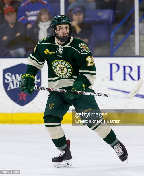 Trey Phillips of the Vermont Catamounts skates against the Massachusetts Lowell River Hawks during NCAA men's hockey at the Tsongas Center on January...