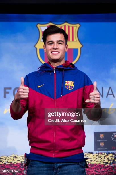 Philippe Coutinho poses prior to signing his new contract with FC Barcelona at Camp Nou on January 7, 2018 in Barcelona, Spain. The Brazilian player...