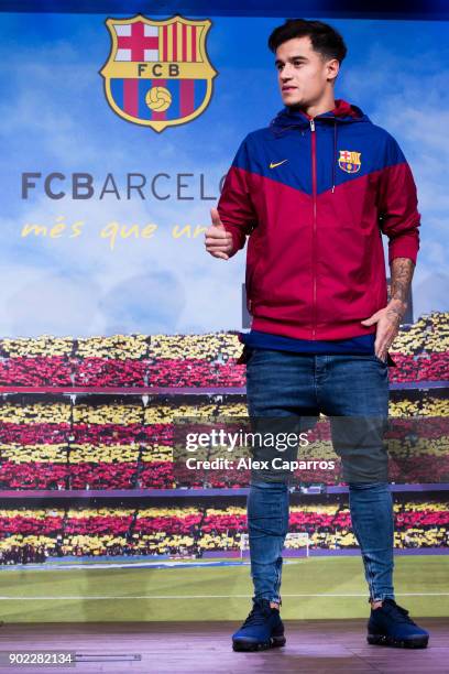 Philippe Coutinho poses prior to signing his new contract with FC Barcelona at Camp Nou on January 7, 2018 in Barcelona, Spain. The Brazilian player...