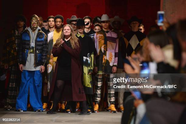 Designer Astrid Andersen and models on the runway at the Astrid Andersen show during London Fashion Week Men's January 2018 at Old Selfridges Hotel...