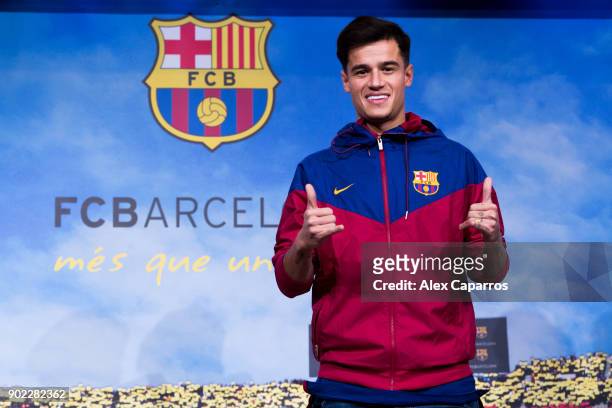 Philippe Coutinho poses prior to signing his new contract with FC Barcelona at Camp Nou on January 7, 2018 in Barcelona, Spain. The Brazilian player...