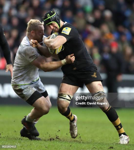James Gaskell of Wasps is tackled by Vincent Koch during the Aviva Premiership match between Wasps and Saracens at The Ricoh Arena on January 7, 2018...