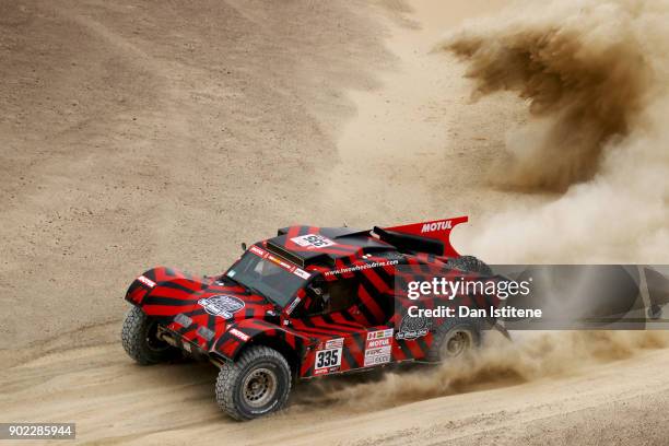 Eugenio Amos of Italy and Two Wheels Drive drives with co-driver Sebastien Delaunay of France in the Ford Buggy 2WD in the Classe : T1.3 : 2 Roues...