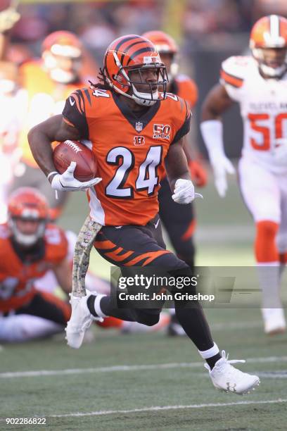 Adam Jones of the Cncinnati Bengals runs the football upfield during the game against the Cleveland Browns at Paul Brown Stadium on November 26, 2017...