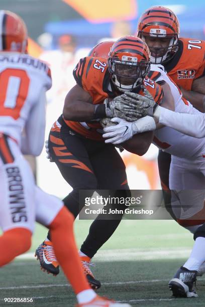 Giovani Bernard of the Cncinnati Bengals runs the football upfield during the game against the Cleveland Browns at Paul Brown Stadium on November 26,...