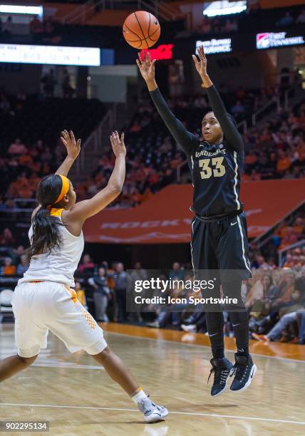 Vanderbilt Commodores guard Christa Reed shoots over Tennessee Lady Volunteers guard Anastasia Hayes during a game between the Vanderbilt Commodores...