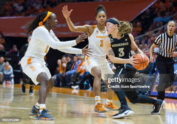 Vanderbilt Commodores guard Rachel Bell is doubled by Tennessee Lady Volunteers guard/forward Jaime Nared and guard Meme Jackson during a game...