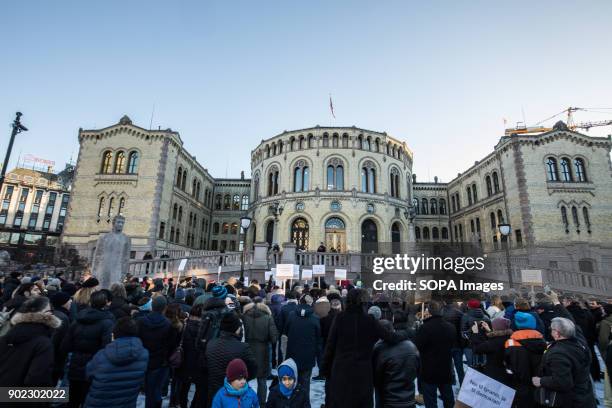 Protesters seen outside the Norwegian parliament. They are condemning the killings and crackdown of protesters by the Iranian clerical regime of...