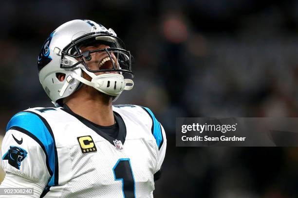 Cam Newton of the Carolina Panthers reacts during warms ups prior to the NFC Wild Card playoff game against the New Orleans Saints at the...