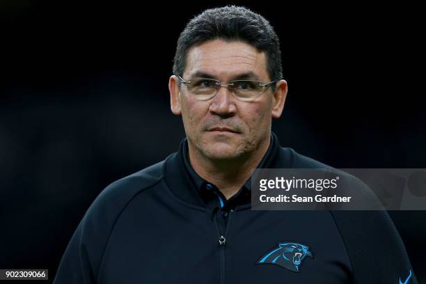 Head coach Ron Rivera of the Carolina Panthers walks onto the field prior to the NFC Wild Card playoff game against the New Orleans Saints at the...