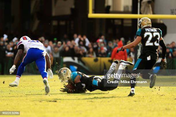 Cornerback Jalen Ramsey of the Jacksonville Jaguars intercepts a pass late in the fourth quarter against the Buffalo Bills during the AFC Wild Card...