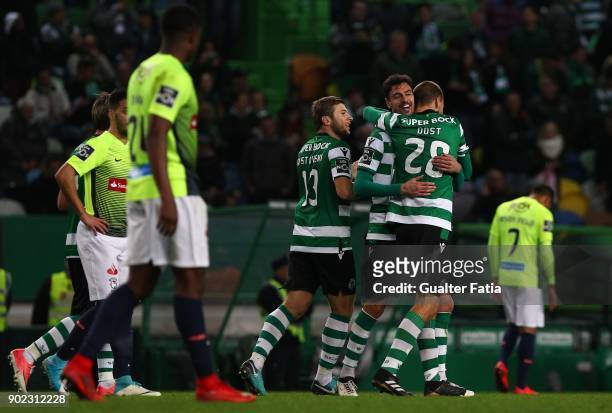 Sporting CP forward Bas Dost from Holland celebrates with teammates after scoring a goal during the Primeira Liga match between Sporting CP and CS...