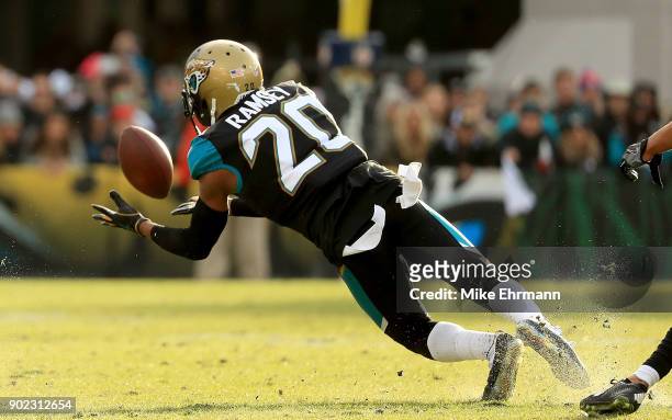 Jalen Ramsey of the Jacksonville Jaguars makes an interception during AFC Wild Card playoff game against the Buffalo Bills at EverBank Field on...