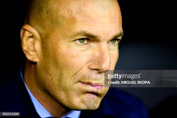 Real Madrid's French coach Zinedine Zidane reacts during the Spanish league football match Celta de Vigo vs Real Madrid at the Balaidos stadium in...
