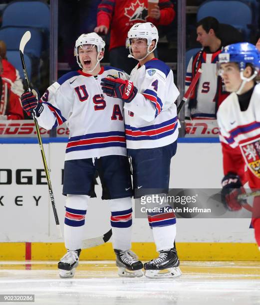 Joey Anderson and Ryan Poehling of United States against Czech Republic during the Bronze Medal Game of the IIHF World Junior Championship at KeyBank...