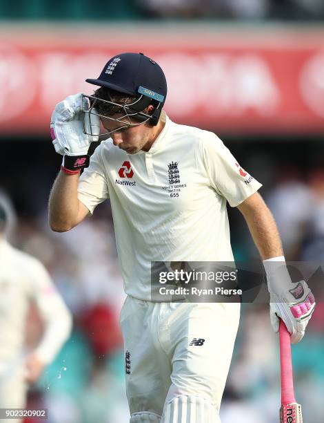 Joe Root of England reacts while batting during day four of the Fifth Test match in the 2017/18 Ashes Series between Australia and England at Sydney...