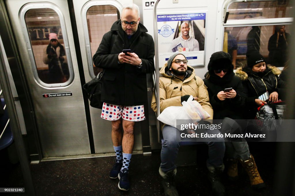 Participants Of Annual No Pants Subway Brave Freezing Temperatures In NYC To Ride Subway In Underwear