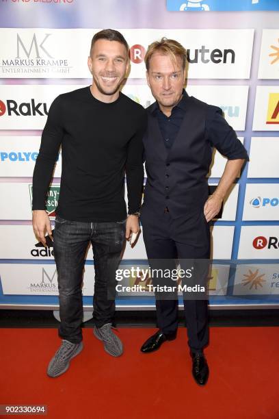 Lukas Podolski and Markus Krampe attend the Schauinsland Reisen Cup 2018 at Schwalbe Arena on January 7, 2018 in Gummersbach, Germany.