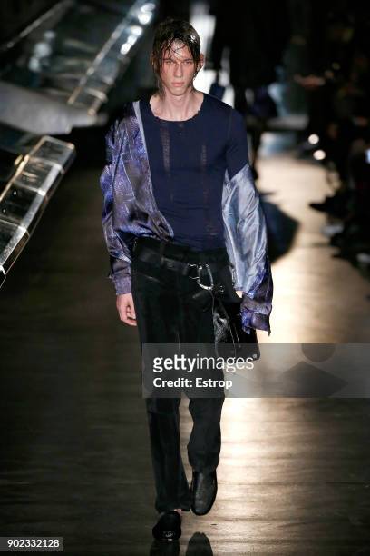 Model walks the runway at the Cottweiler show during London Fashion Week Men's January 2018 at Natural History Museum on January 6, 2018 in London,...