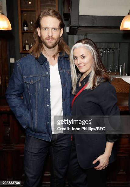 Craig McGinlay and Catherine Hayward attend the LFWM Official Party & Pub Lock-In during London Fashion Week Men's January 2018 at The George on...