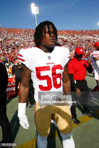 Reuben Foster of the San Francisco 49ers stands on the sideline prior to the game against the Los Angeles Rams at Los Angeles Memorial Coliseum on...