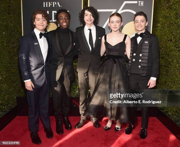 The cast of Stranger Things, Gaten Matarazzo, Caleb McLaughlin, Finn Wolfhard, Sadie Sink and Noah Schnapp attend The 75th Annual Golden Globe Awards...