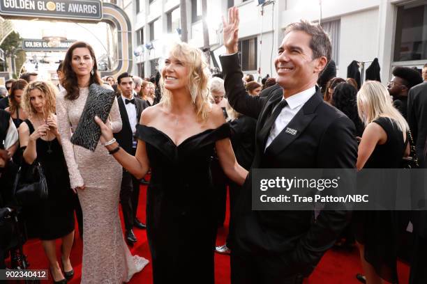 75th ANNUAL GOLDEN GLOBE AWARDS -- Pictured: Janet Holden and actor Eric McCormack arrive to the 75th Annual Golden Globe Awards held at the Beverly...