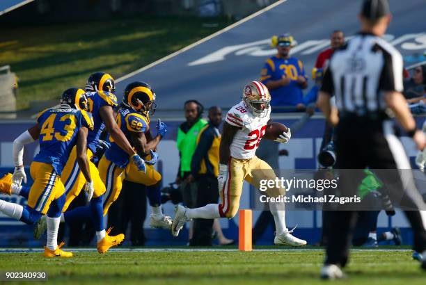 Carlos Hyde of the San Francisco 49ers rushes during the game against the Los Angeles Rams at Los Angeles Memorial Coliseum on December 31, 2017 in...