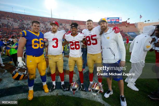 Iowa alumni Austin Blythe of the Los Angeles Rams along with C.J. Beathard, Greg Mabin and George Kittle of the San Francisco 49ers gather on the...