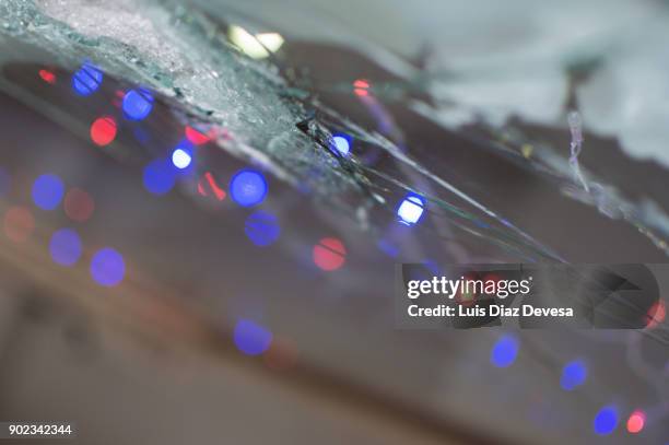 smashed cafeteria  window in christmast - christmas thief stock pictures, royalty-free photos & images