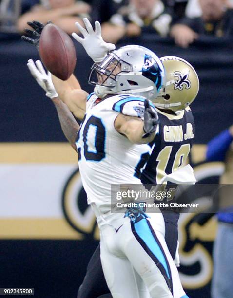 Carolina Panthers free safety Kurt Coleman breaks up a pass intended for New Orleans Saints wide receiver Ted Ginn Jr. During the first half in their...