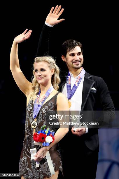 Madison Hubbell and Zachary Donohue celebrate on the medals podium for the Championship Dance during the 2018 Prudential U.S. Figure Skating...