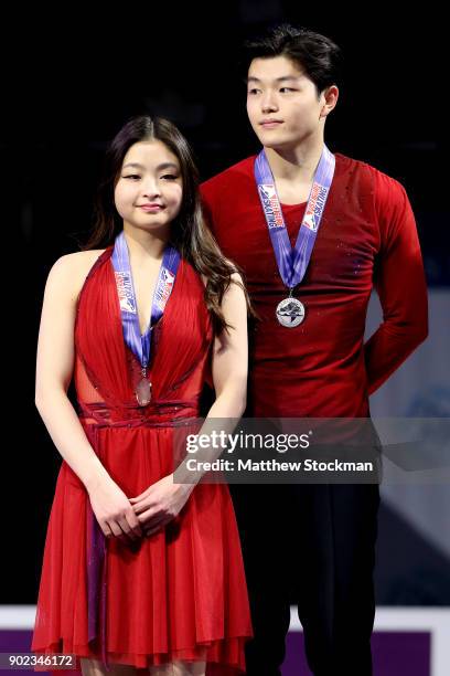 Maia Shibutani and Alex Shibutani stand on the medals podium for the Championship Dance during the 2018 Prudential U.S. Figure Skating Championships...