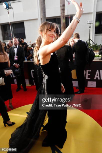 75th ANNUAL GOLDEN GLOBE AWARDS -- Pictured: Actor Dakota Johnson arrives to the 75th Annual Golden Globe Awards held at the Beverly Hilton Hotel on...