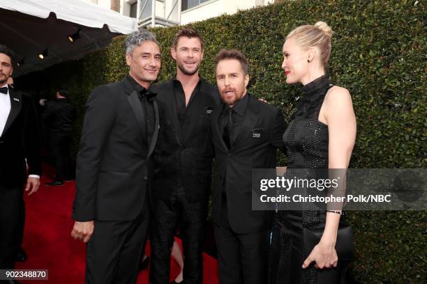 75th ANNUAL GOLDEN GLOBE AWARDS -- Pictured: Director Taika Waititi and actors Chris Hemsworth, Sam Rockwell and Leslie Bibb arrive to the 75th...