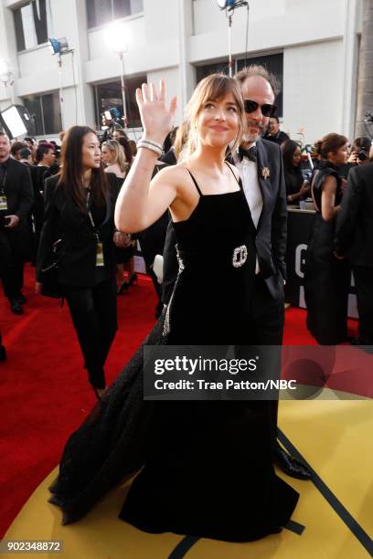 75th ANNUAL GOLDEN GLOBE AWARDS -- Pictured: Actor Dakota Johnson arrives to the 75th Annual Golden Globe Awards held at the Beverly Hilton Hotel on...